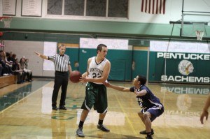 Mike Aiduk, here defended by Raul Navarro, would later score the winning basket for Pentucket