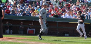 Will Swanner home run trots past pitcher Mike McCarthy