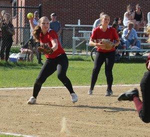 Hayley Catania prepares to throw to first